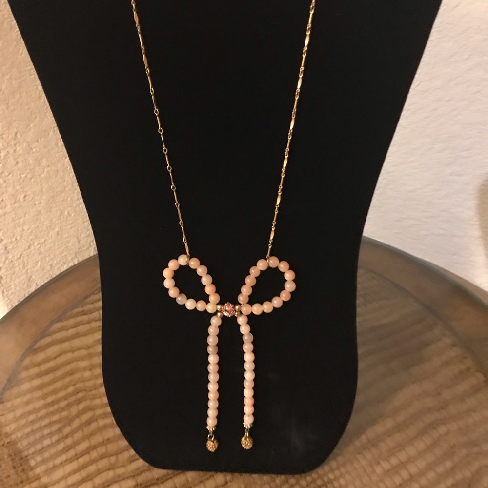 Lenora dame Anthropologie pink bow necklace